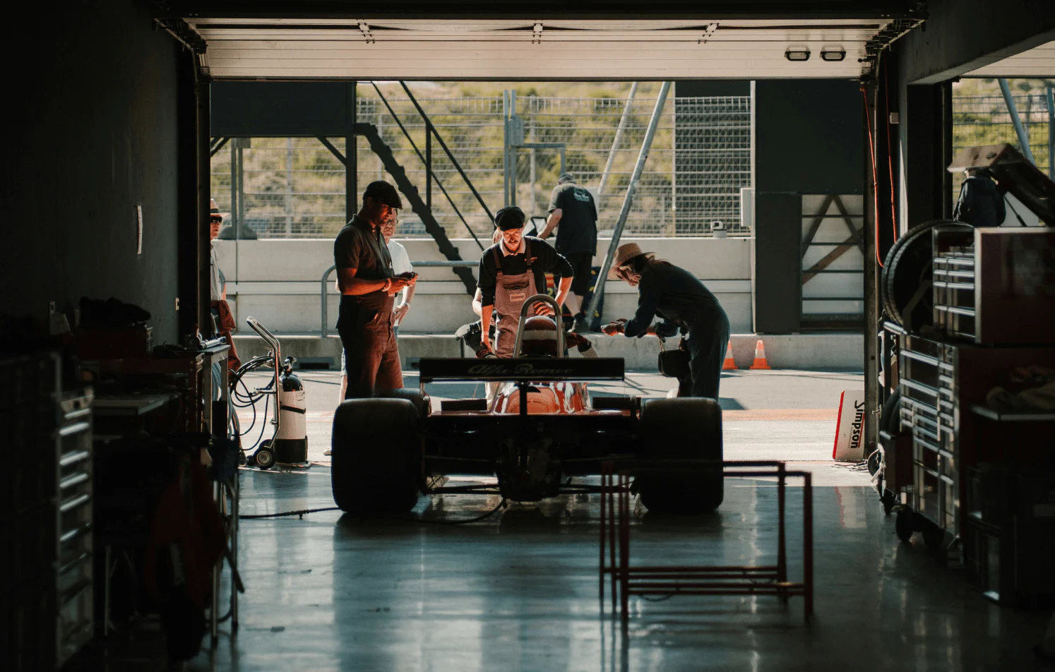 Mechanics working on a race car
