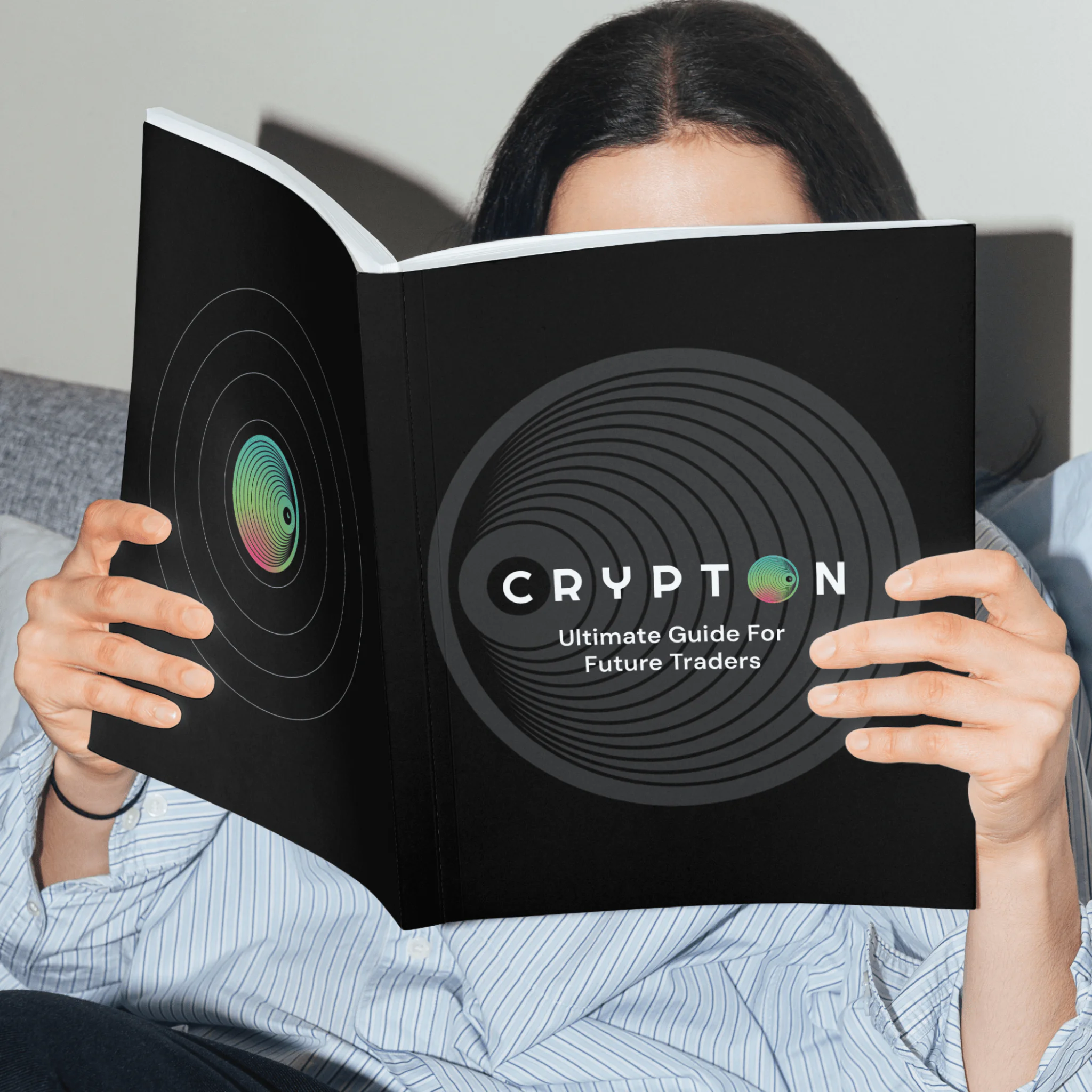 Person reading Crypton guidebook