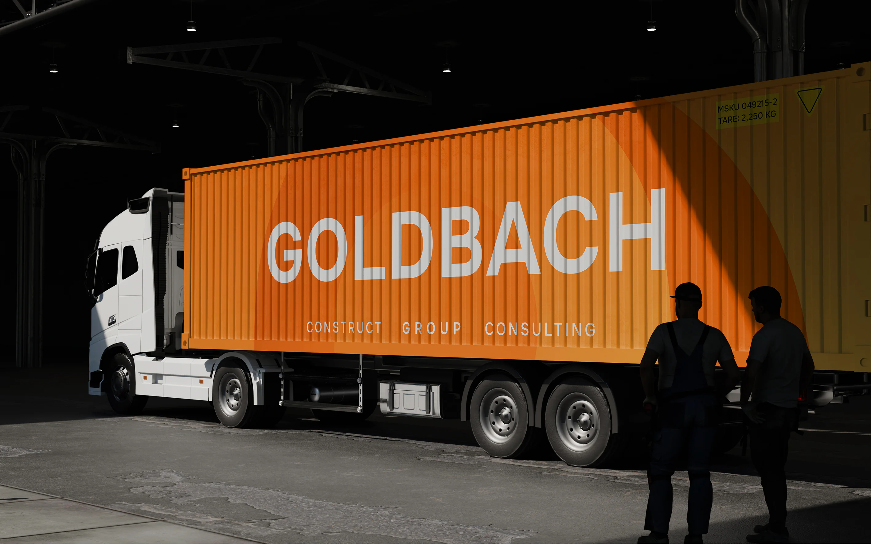 Goldbach branded cargo truck with an orange container parked inside an industrial warehouse facility.