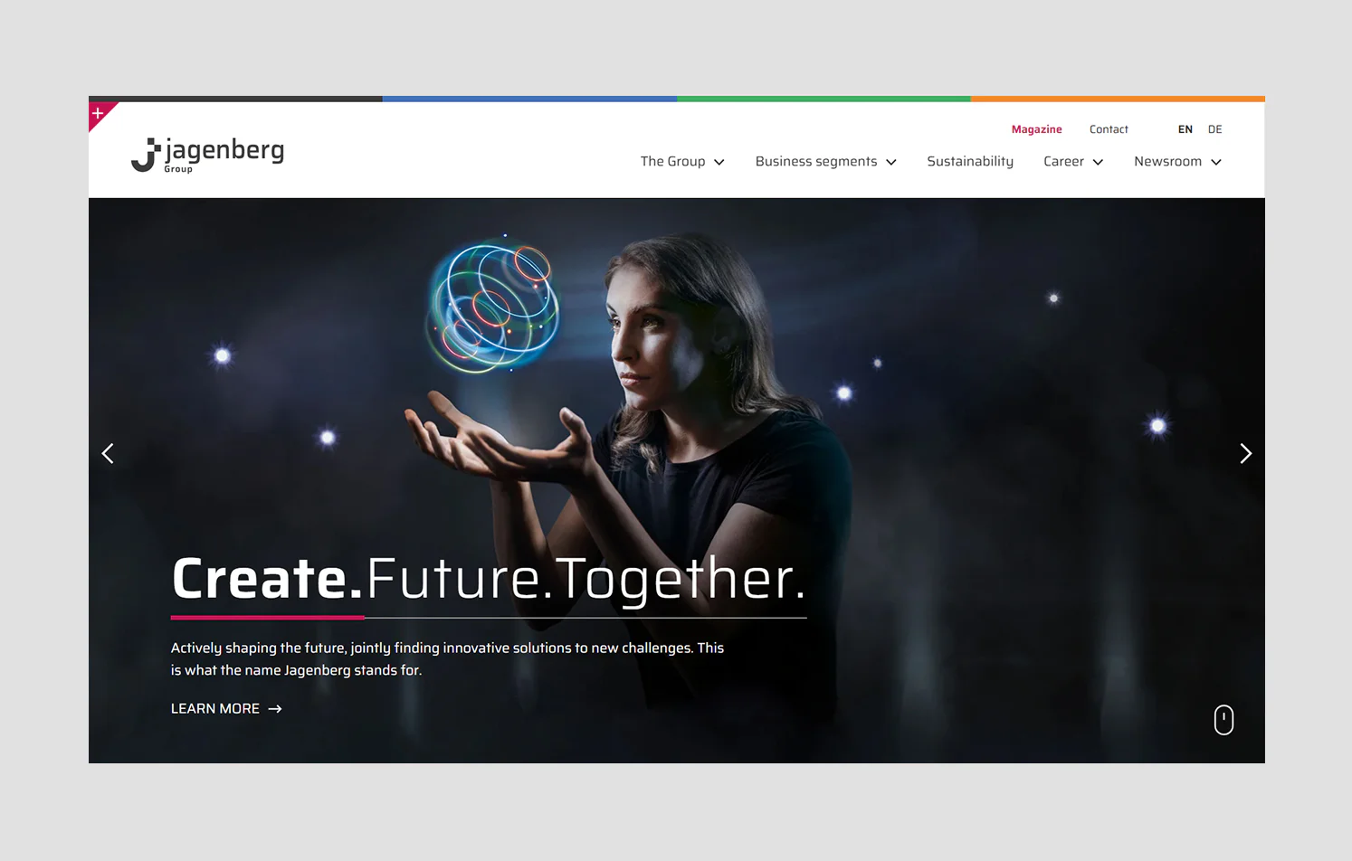 Corporate website homepage for Jagenberg Group featuring industrial branding, multilingual navigation, and a futuristic hero section.