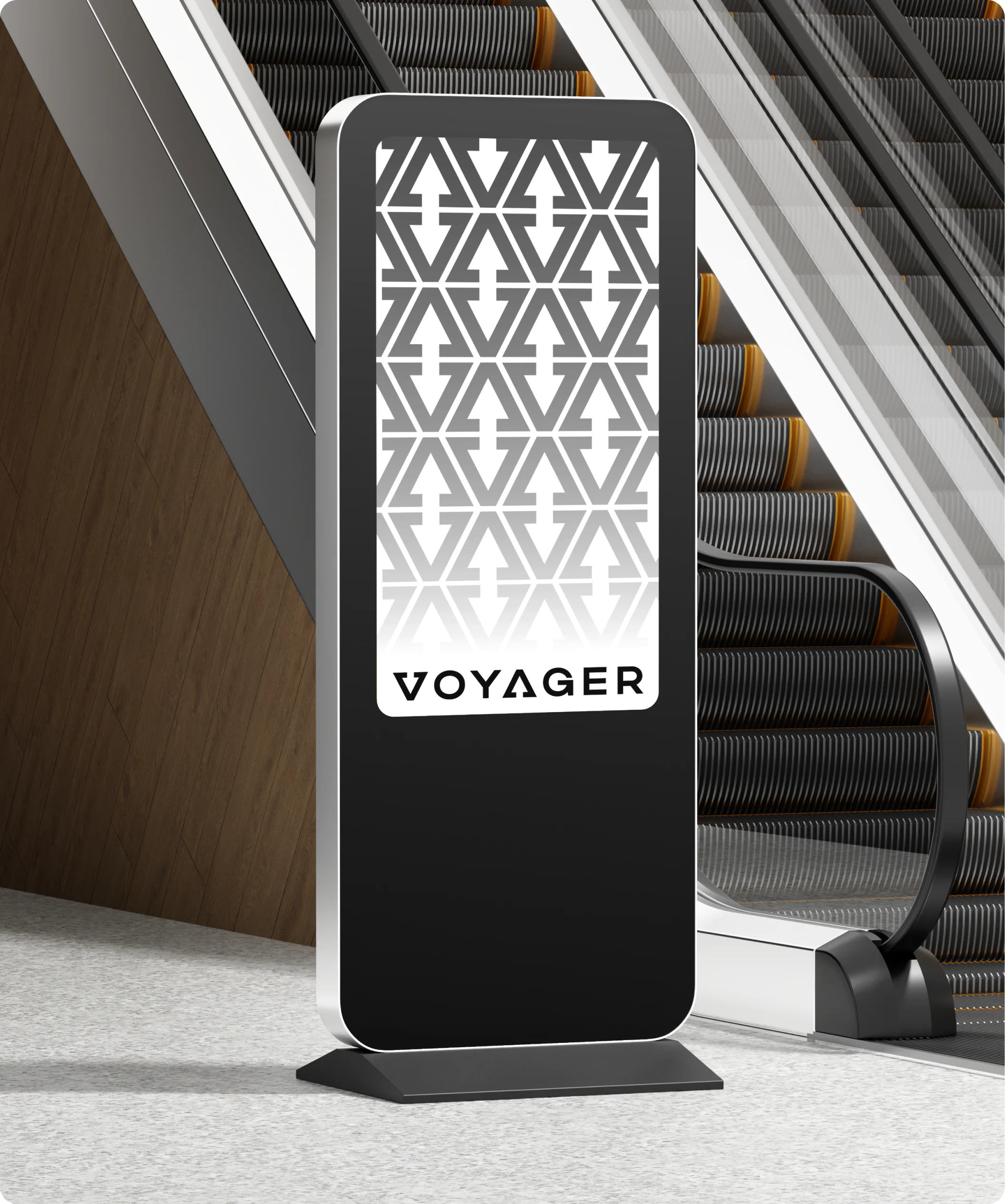 branded digital signage with a custom geometric pattern displayed beside an escalator