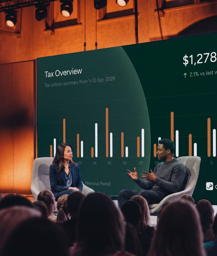 tax overview dashboard displayed during a business conference presentation