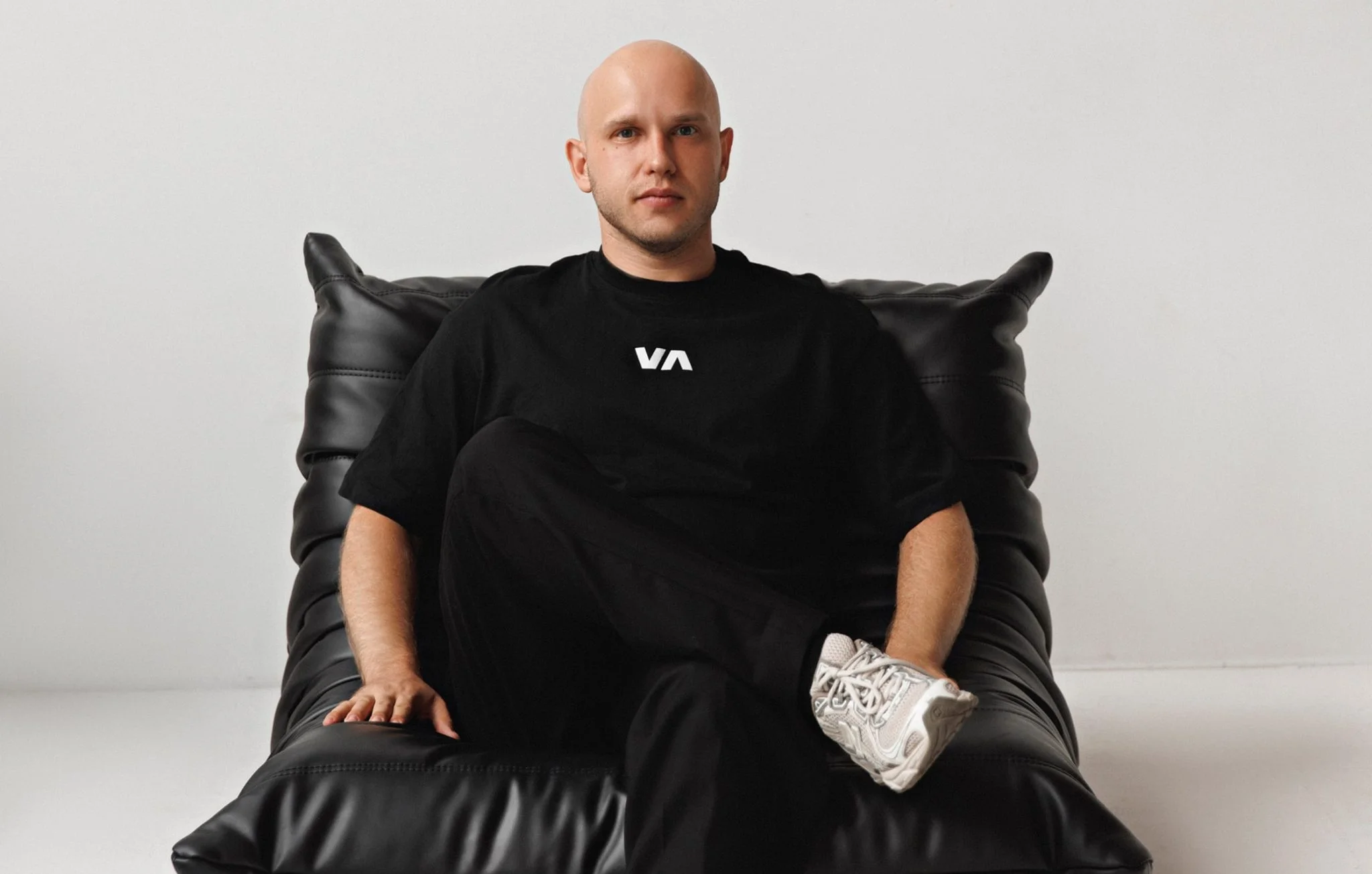 Portrait of Vlad Bahatskyi seated