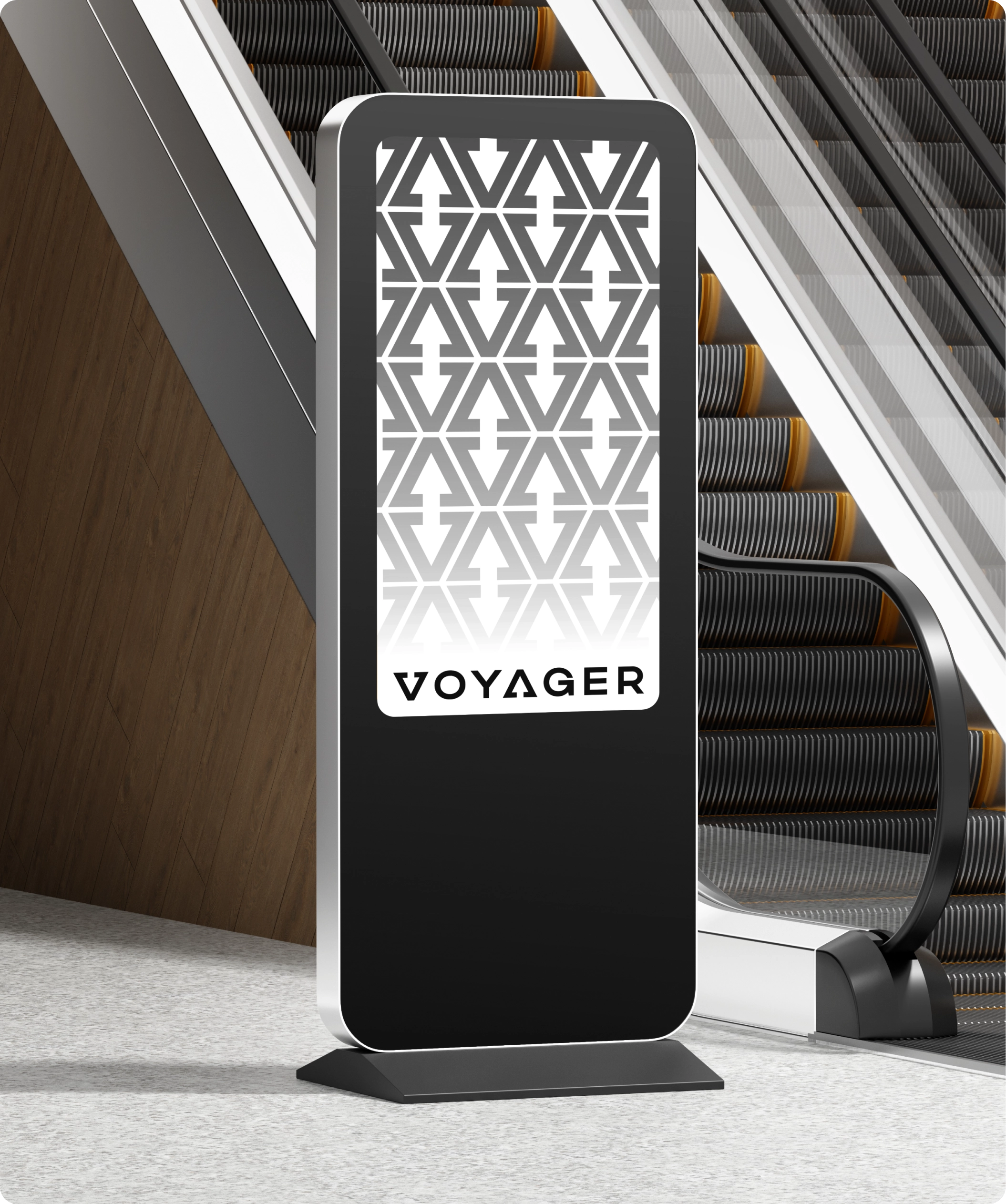 branded digital signage with a custom geometric pattern displayed beside an escalator